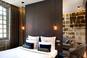 Hotels Boutique Hotel des Remparts & Spa : photos des chambres