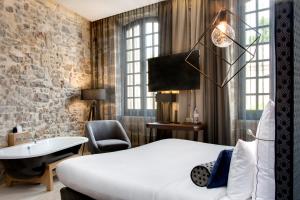 Hotels Boutique Hotel des Remparts & Spa : photos des chambres