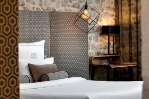 Hotels Boutique Hotel des Remparts & Spa : photos des chambres