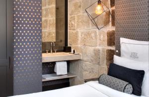 Hotels Boutique Hotel des Remparts & Spa : photos des chambres