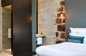 Hotels Boutique Hotel des Remparts & Spa : photos des chambres