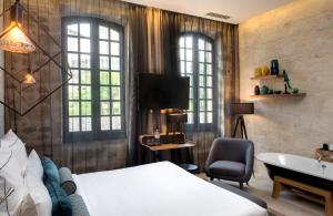 Hotels Boutique Hotel des Remparts & Spa : photos des chambres