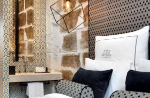 Hotels Boutique Hotel des Remparts & Spa : photos des chambres