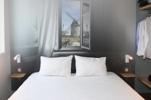 Hotels B&B HOTEL Les Herbiers : photos des chambres