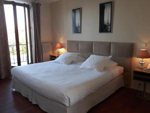 Hotels L'Oasis : photos des chambres