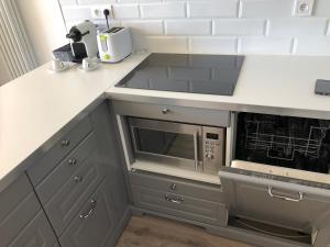 Appartements studio pieds dans l’eau : photos des chambres