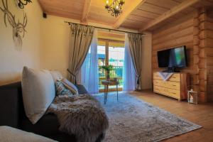 Folk Resort Domki i Apartamenty