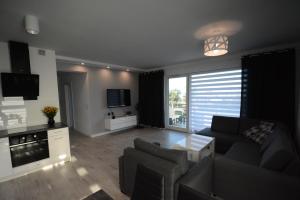 Apartament z widokiem na jezioro Niegocin