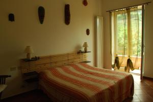 Dreibettzimmer mit Gartenblick