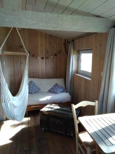 Chalets La cabane en bois : photos des chambres