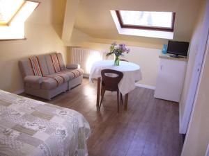 Appartements Aux Studios du Parc : photos des chambres