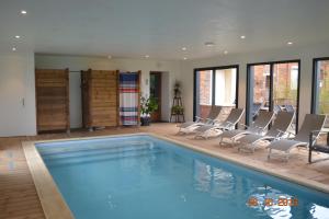 Maisons de vacances Spa et Piscine interieure privee 24 h sur 24 et 7j sur 7 : photos des chambres