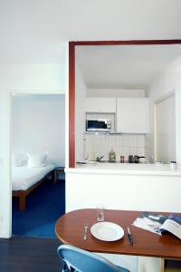 Appart'hotels Sejours & Affaires Lyon Saint-Nicolas : photos des chambres
