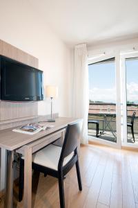 Appart'hotels Sejours & Affaires Geneve Gex Les Rives Du Leman : photos des chambres