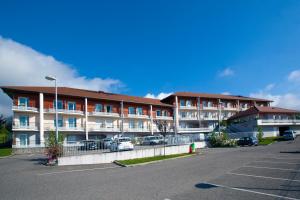 Appart'hotels Sejours & Affaires Geneve Gex Les Rives Du Leman : photos des chambres