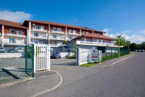 Appart'hotels Sejours & Affaires Geneve Gex Les Rives Du Leman : photos des chambres