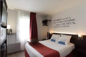 Hotels Kyriad Hotel La Fleche : photos des chambres