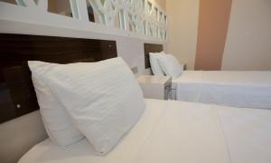 Deluxe Triple Room with Balcony room in Ozbay Hotel