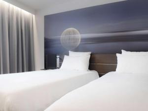 Hotels Novotel Paris Charles de Gaulle Airport : photos des chambres