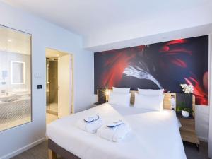 Hotels Novotel Poitiers Site du Futuroscope : photos des chambres