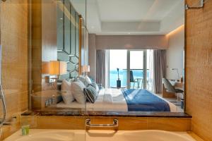 Deluxe Double Room with Balcony and Hotel Private Beach Access room in Royal Central Hotel The Palm