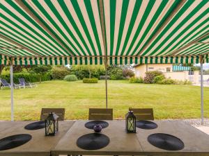 Maisons de vacances Group Getaway in Saint-Nexans : photos des chambres