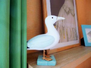 Appartements Studio Les Pieds dans l'eau : photos des chambres