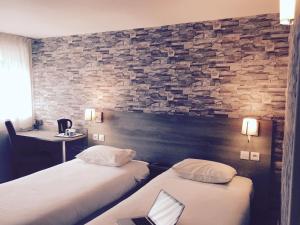 Hotels Kyriad Valenciennes Sud - Rouvignies : Chambre Lits Jumeaux avec Lit d’Appoint - 301