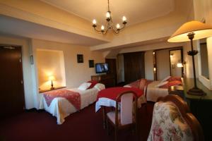 Hotels Hostellerie Le Beffroi : photos des chambres