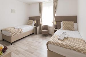 Deluxe Twin Studio room in Residence Mutschellen
