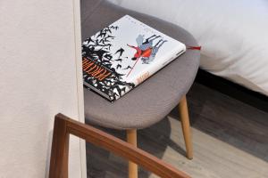 Appartements Les Suites Du Cygne : photos des chambres