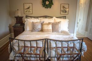 Queen Room with Balcony room in EJ Roberts Mansion