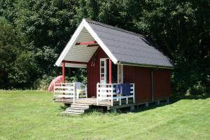 Economy Cottage with Shared Bathroom 50m away. (2 Adults) room in Husodde Strand Camping & Cottages