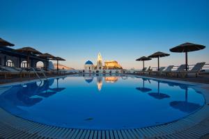 Thira's Dolphin hotel, 
Santorini, Greece.
The photo picture quality can be
variable. We apologize if the
quality is of an unacceptable
level.