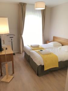 Appart'hotels Domitys Rosa Gallica : photos des chambres