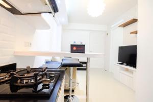 New & Clean 2BR Bassura City Apartment By Travelio