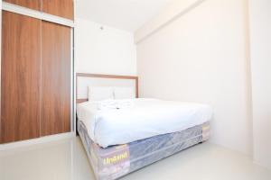 New & Clean 2BR Bassura City Apartment By Travelio