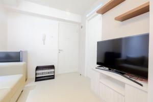 New & Clean 2BR Bassura City Apartment By Travelio