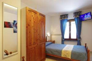 Camera Doppia con Letti Singoli e Bagno in Comune
