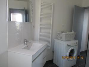 Appartements Appartement Bord de Mer : photos des chambres