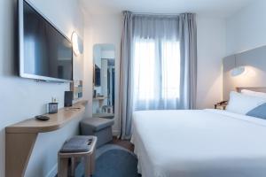 Hotels Hotel Le Marcel Paris Gare de l'Est : photos des chambres