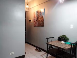 1BR with Balcony Overlooking Pool Chateau Elysee Near NAIA