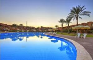 Chalet Ground floor two bedrooms With largeTerrace In Stella Di Mare sea view Ain El Sokhna for Families Only