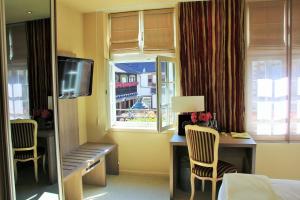 Hotels Hostellerie au Cygne : photos des chambres