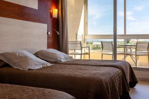 Hotels Hotel Les Dunes : photos des chambres