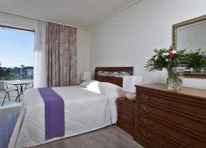 Two-Bedroom Suite Sea View room in Amarilia Hotel