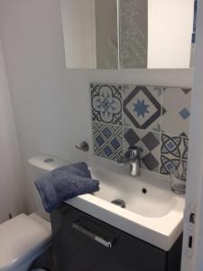 Appartements Le petit studio honfleurais : photos des chambres