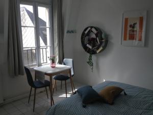 Appartements Le petit studio honfleurais : photos des chambres