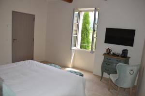 Maisons d'hotes Le Clos D'Olea : photos des chambres