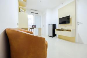 Simply & Clean 2BR Bassura City Apartment By Travelio